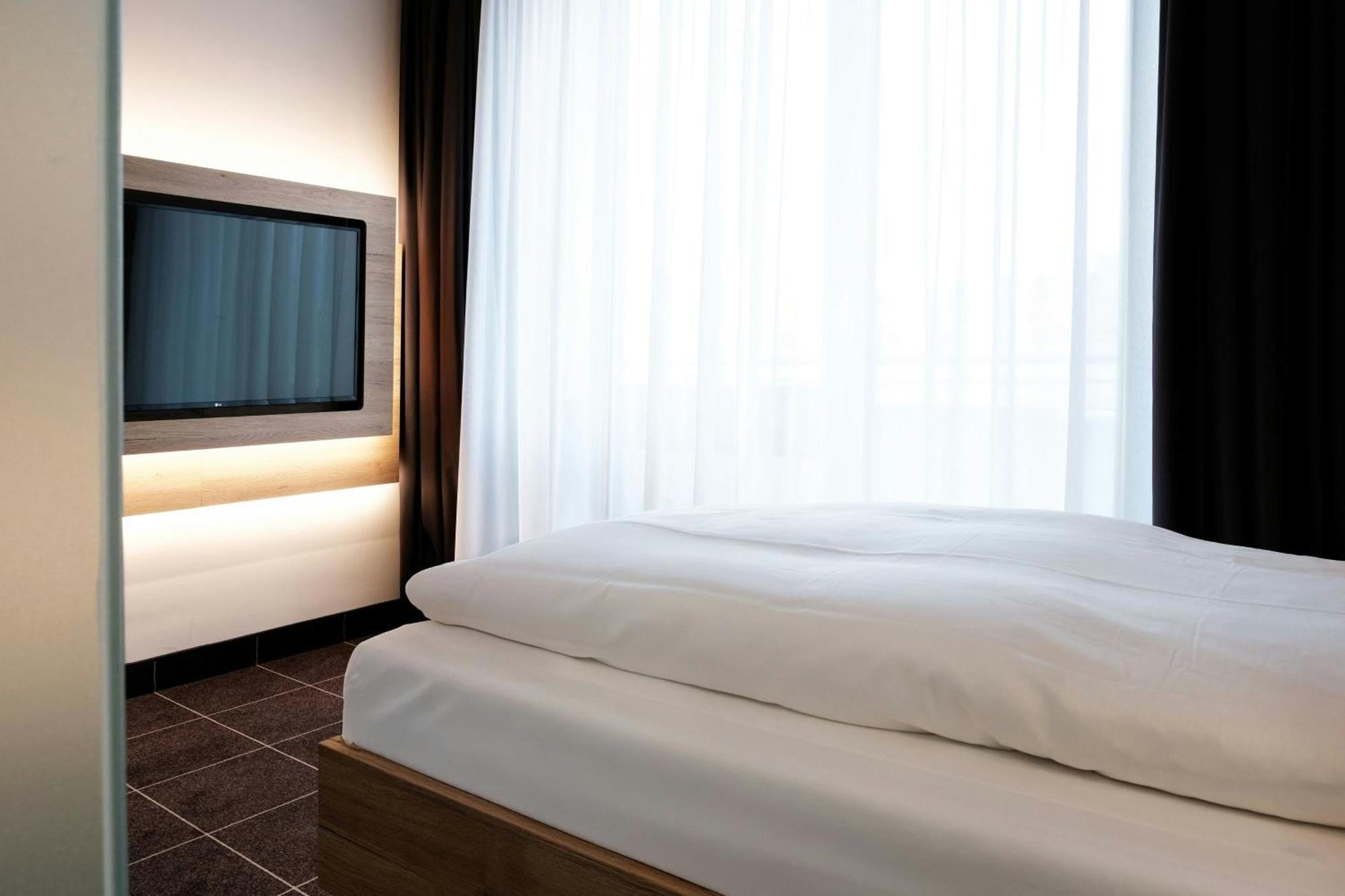 Four Ratingen Dusseldorf Airport Hotel Bagian luar foto